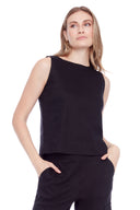 Model wearing the Lila Linen Sleeveless Top in Black, front view.
