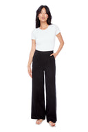 Model wearing the Isla Linen Wide Leg Pant in Black, front view.