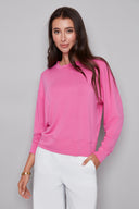 Model wearing the Alessia Provence Sweatshirt in Cherry, featuring a relaxed fit, crew neckline, and dropped shoulders, front view.