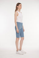 Model wearing the Dakota Bluestone Compression Bermuda Shorts, side view.