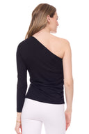 Model wearing the Claude Jersey One-Shoulder Top in Black, back view.