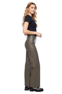 Model wearing the Yaelle Faux Leather Ankle Pant in Taupe, side view.