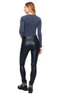 Model wearing the Vicky Faux Leather Pant in Black, back view.