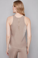 Back view of the Luna Belize almond Satin Tank Top, highlighting the back zip closure and elegant sleeveless silhouette.