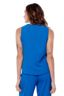 Model wearing the Dani Vegan Silk Sleeveless Top in Cobalt, back view.