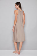 Back view of the Daphne Belize Satin Sleeveless Dress in Almond, featuring the back zip closure and flowing A-line silhouette.