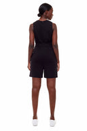 Back view of model wearing the Kylie Light Ponte Belted Romper in black with a streamlined silhouette and belted waist.