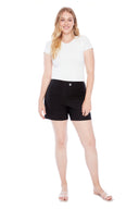 Model wearing the Elizabeth Solid Techno Pocket Short in Black, featuring oversized front pockets, a pull-on waistband, and a flattering slim fit, front view.