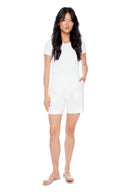 Model wearing the Isla Linen Short in White, front view.