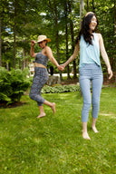 Model wearing the Gwyneth 
Toulouse (French Floral) Ankle Pant featuring a slim ankle silhouette and allover floral print