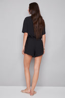 Back view of the Nora black Air Flow Lounge Short, highlighting the relaxed fit and comfortable pull-on waistband.