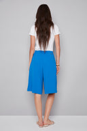 Back view of the Avery Vegan breeze  Silk Bermuda Short, highlighting the streamlined silhouette and clean finish.