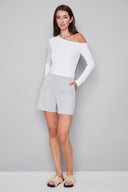 Model wearing the Val Grey Striped Techno Short in Grey Stripe, featuring a mid-rise pull-on waistband, angled side pockets, and a slim fit, front view.