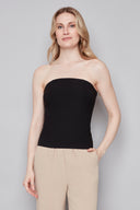 Model wearing the Bryana Techno Tube Top in Black, featuring a structured strapless silhouette, slim fit, and subtle boning, front view.