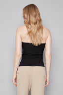 Model wearing the Bryana Techno Tube Top in Black, featuring a structured strapless silhouette, slim fit, and subtle boning, back view.
