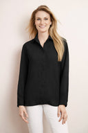 Model wearing the Camillia Air Flow Button-Down Long Sleeve Top in Black, featuring a slim fit, long sleeves, and classic button-front design, front view.