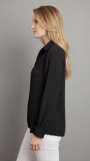 Side view of model wearing the Camillia black Air Flow Button-Down Long Sleeve Top, showcasing the streamlined silhouette and straight point collar.