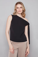 Model wearing the Angel Vegan Silk Tie-Shoulder Top in Black, featuring an asymmetric neckline and statement shoulder tie detail, front view.