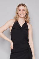 Model wearing the Rose black Air Flow Halter Top in Black, featuring a draped cowl halter neckline and slim silhouette, front view.