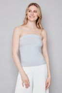 Model wearing the Bryana Blue Striped Techno Tube Top in Blue Stripe, featuring a structured strapless silhouette and subtle boning, front view.