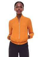 Woman wearing Kamala Vegan Silk Bomber Jacket in Marseille, front view.