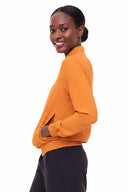 Woman wearing Kamala Vegan Silk Bomber Jacket in Marseille, side view.