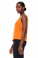 Model wearing the Kate Vegan Silk Tank in Marseille, side view