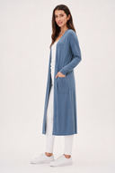 Model wearing the Claudia Bamboo Duster in Bluestone, side view.