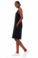 Model wearing the Beyonce Light Ponte Racerback Dress in Black, side view.