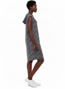 Model wearing the Salma Floral Hooded Bamboo Dress in 
Toulouse (French Floral) , side view.